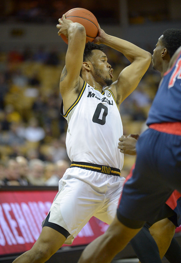 Torrence Watson looks for an open teammate